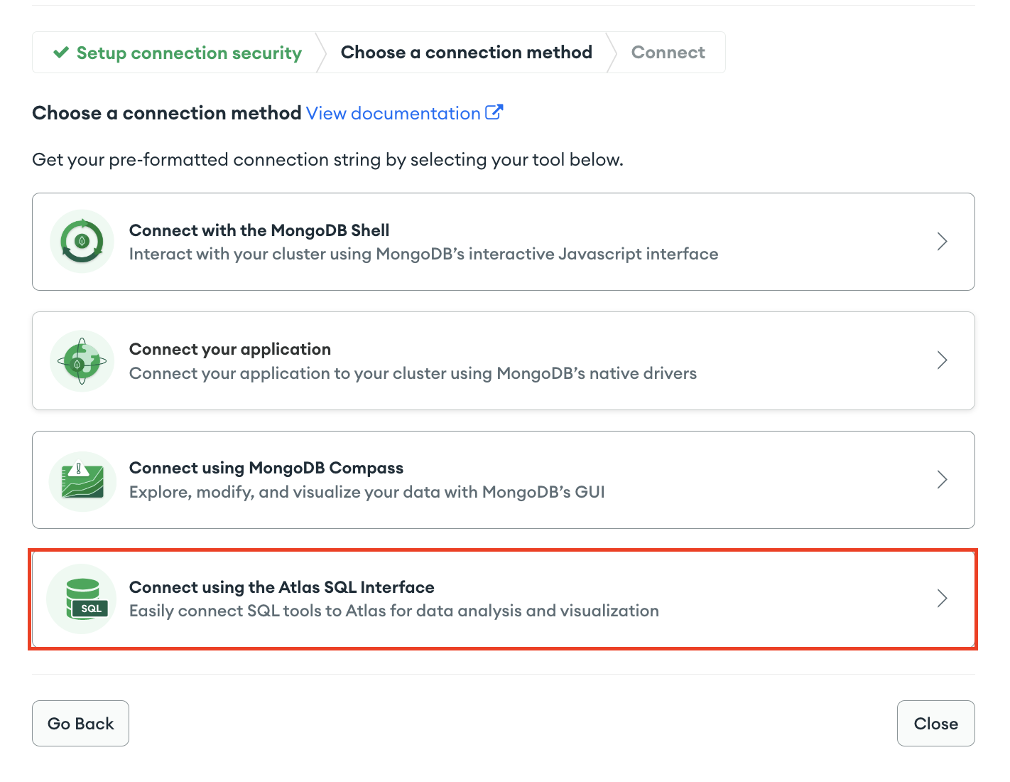 Screenshot of the Atlas connection modal with "Connect using the SQL Interface" option highlighted.